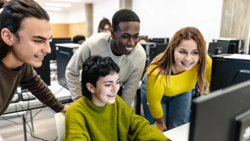 young-classmates-studying-together-inside-classroom